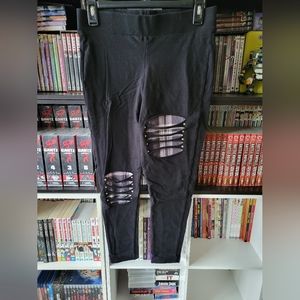 Torrid leggings with plaid cut outs in size 0
